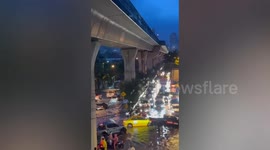 Tropical thunderstorm storm hits Bangkok causing flash floods across city