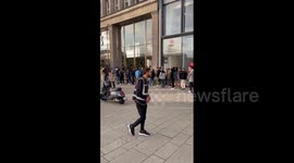 Customers form huge lines outside Apple store in Hamburg as iPhone 15 is released