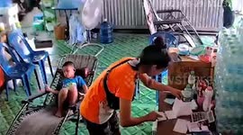Boy flips over while fidgeting in folding chair