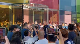 Excited customers flock to stores for Apple iPhone 15 launch in China