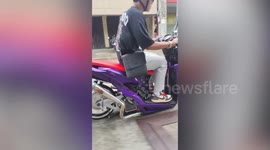 Low rider! Modified scooter hands just inches from the road