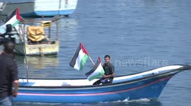 Palestinians take part in a protest to demand the lifting of the Israeli blockade on Gaza, in the sea port of Gaza city