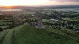 Scores of people gather at the Glastonbury Tor for the Autumn Equinox Sunrise