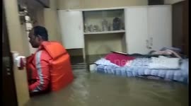 NDRF officials rescue 25 people stranded after heavy rainfall leads to river overflow in western India