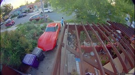 Neighborhood Kid Tips Motorcycle Into Classic Corvette