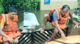 NDRF officials rescue 25 people stranded after heavy rainfall leads to river overflow in Nagpur, western India