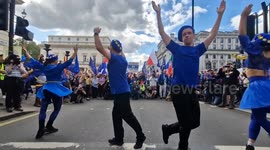 Dancers entertain the crowd during National Rejoin the EU March in London
