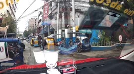 Hitch hiker! Stray dog steals ride on the roof of tuktuk