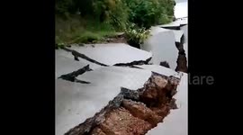 Torrential rains trigger landslide and road collapse in southern China