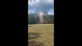 Long-Lived Tall Dust Devil In The Yard