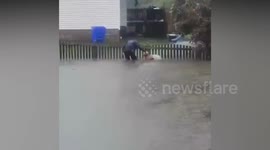Hero cop saves pet pitbull dog stranded in flood