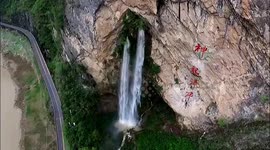 Waterfall unleashes twin torrents at Chinese scenic masterpiece amidst seasonal downpour