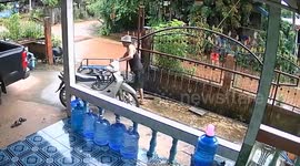Rusty iron gate falls on grandfather outside his own home