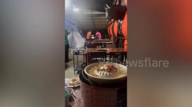 Storm hits BBQ restaurant as customers eat grilled meat