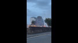Historic Ayr Station Hotel on fire. Filmed outside the Subway store on Smith Street on 26th September at 07:04.  Hotel still ablaze after 14 hours