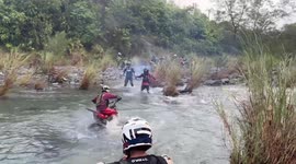 Off-road rider washed away while trying to cross through fast-flowing stream