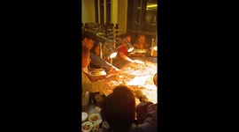Diners tuck into dish served in giant sizzling pan in the Philippines