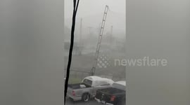 Poles fall during storm in Thailand
