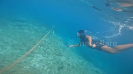 Philippine Coast Guards remove 'hazardous' buoy barrier installed by Chinese Coast Guard in contested atoll