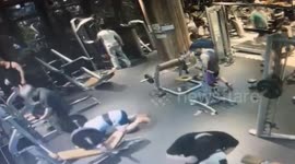 Bungling weightlifter drops barbell on fellow gym user in China