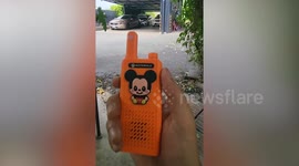 Pet owner summons his Siberian Husky using walkie talkie