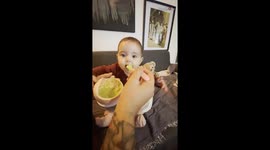 Disappointment sweeps across baby's face as she tastes brackish broccoli for the first time