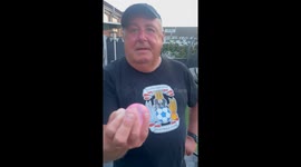 Dad & son bring a splash of excitement to family BBQ with their impromptu water fight