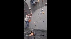 Boulderer Slips On A Difficult Climb