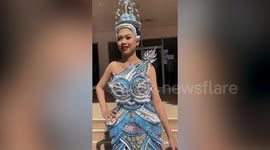 Designer makes fabulous eco-friendly dress from plastic straws and soda can tabs