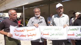 Palestinians take part in a protest against the Israeli siege on the Gaza Strip, in front of the Erez Crossing in Beit Hanoun in the northern Gaza Strip