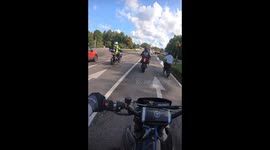 Cop Clipped By Fellow Motorist