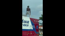 Dancer On Top Of An Ambulance