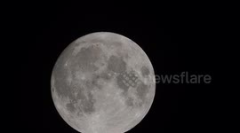Full Harvest Super Moon seen above Kent, UK