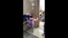 Allera Padgett, kindergarten teacher in New Orleans, LA is allowing her students to select their morning greeting before entering the classroom.