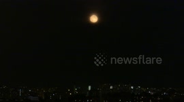 Harvest moon appears in St Petesrburg in Russia - the last supermoon this year