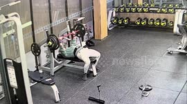 Fitness coach trapped under 240lbs barbell saved by female gymgoer in China