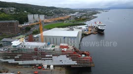 Aerial footage of MV Glen Rosa ferry under construction at Ferguson Marine shipyard, Port Glasgow, Scotland, UK
