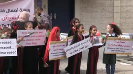 Palestinian children take part in a protest against the Israeli siege on the Gaza Strip, on Arab Children's Day in front of the UNDP headquarters in Gaza City.