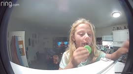Girl Sneaks a Cookie Without Mom’s Permission