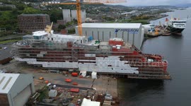 Aerial footage of MV Glen Rosa ferry under construction at Ferguson Marine shipyard, Port Glasgow, Scotland, UK