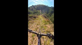 Cyclists Descends Beautiful Ridgeline Trail in Belgium