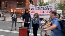 People Take Part in March in Solidarity with Cuba in New York, NY, USA