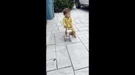 Brother Gives His Little Sister a Push