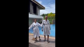 Elderly couple dance at different holiday locations to mark golden wedding anniversary