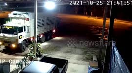 Driver tries to stop 8-wheeler truck from rolling backwards by dragging