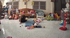Fan cover flies off towards toddler lying on floor with her grandfather
