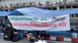 Protesters gather outside Government House in Bangkok