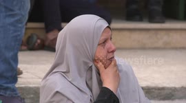 Palestinian families of the martyrs and the wounded, take part in a protest against the Palestinian Authority's decision to cut their salaries