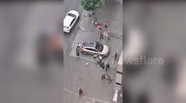 Heroic passers-by lift car to save girl trapped underneath in China
