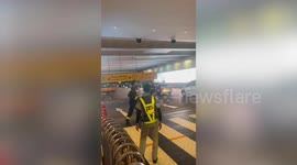 Suspected shooting sends shoppers running from mall in Bangkok, Thailand